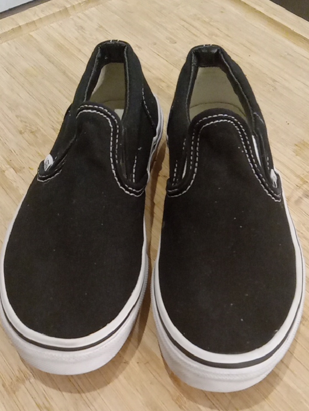 Vans Kids Black Slip-On Canvas Sneakers with White Trim